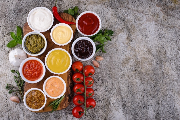 Set of different sauces ketchup mustard and mayonnaise