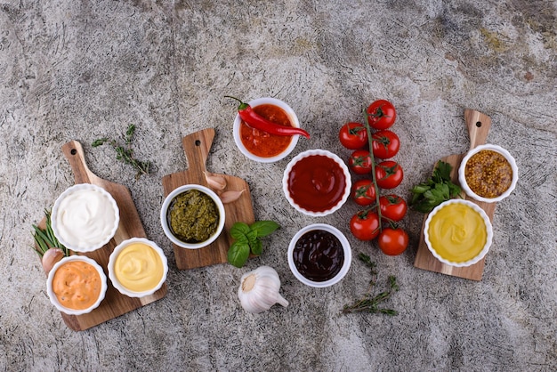 Photo set of different sauces ketchup mustard and mayonnaise