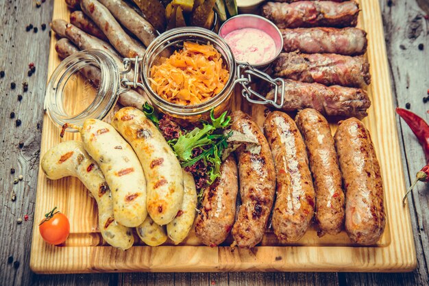 A set of different sausages, grilled on plate