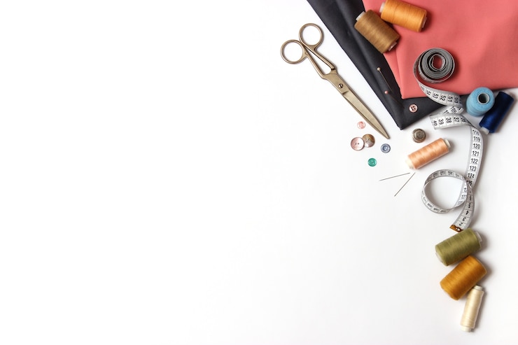 Photo set of different sewing accessories on a white background closeup