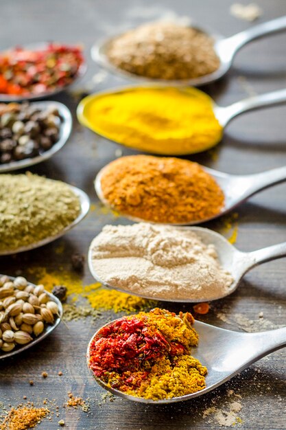 Set of different spices and spices in spoons