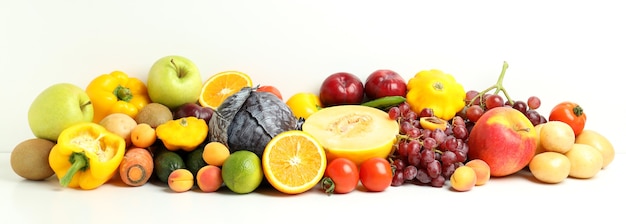 Set of different vegetables and fruits on white background