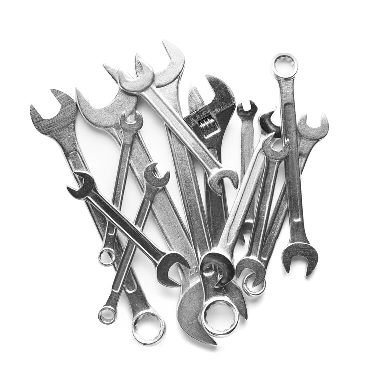Photo set of different wrenches on white background top view plumbing tools