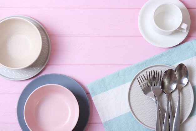 Set of dishes and kitchen utensils top view