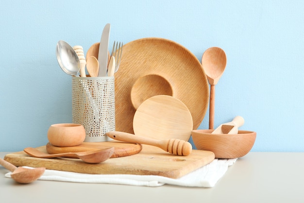 Set of dishes made of wood on the table