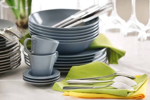 Set of dishware on table in restaurant