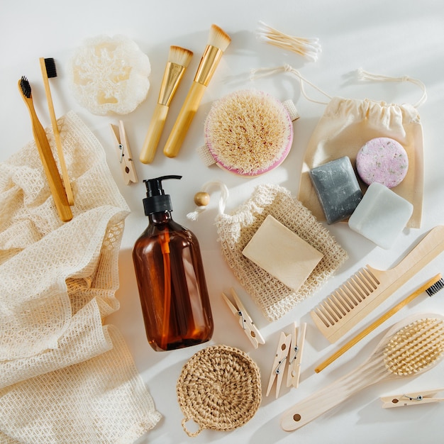 Set of Eco cosmetics products and tools. Soap, Shampoo Bottles, bamboo toothbrush 