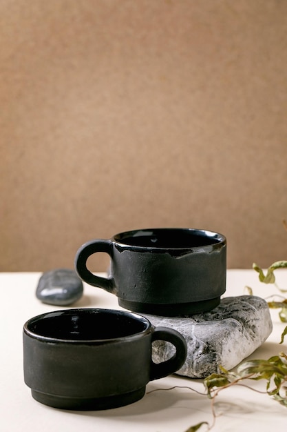 Set of empty grey ceramic cups