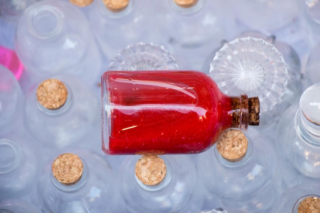 Set of Empty little transparent bottles in a box