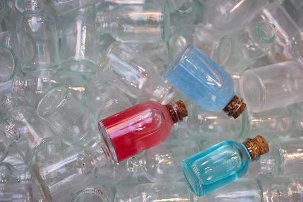 Set of Empty little transparent bottles in a box