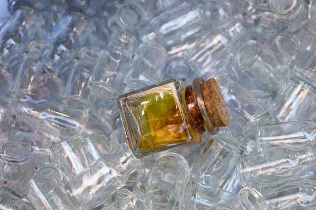 Set of Empty little transparent bottles in a box