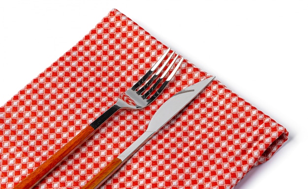 Set of fork and knife on towel
