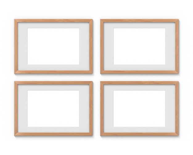 벽에 걸려있는 테두리가있는 4 개의 수평 나무 프레임 세트