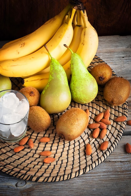 Set of fruits and ice the ingredients for a smoothie