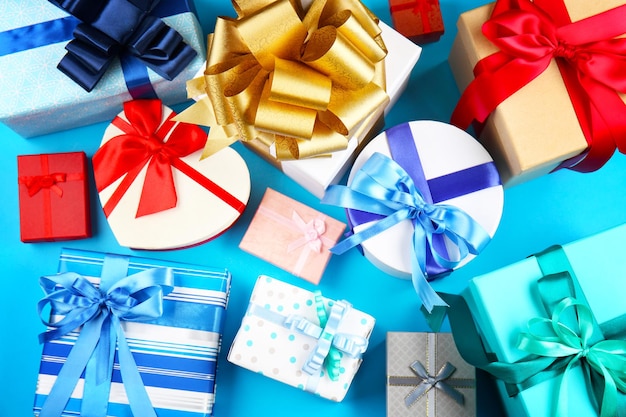 Set of gift boxes on color background