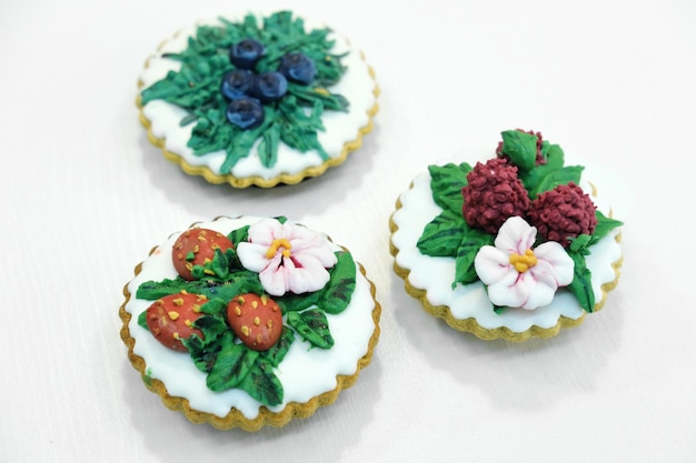 A set of gingerbread in the form of flowers on a white background Gift set Top view