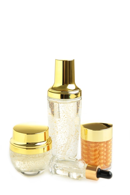 Set of gold cosmetic containers