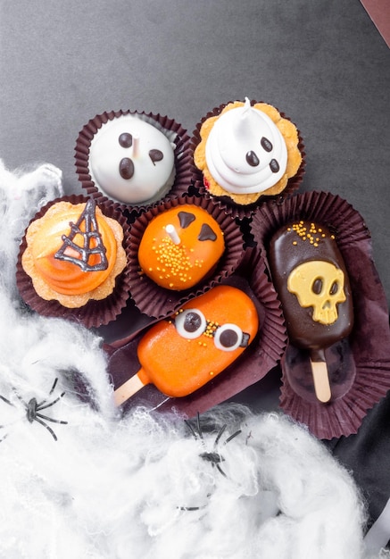 Set of Halloween sweets on black background