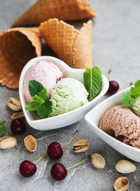 Photo set of ice cream scoops of different colors and flavours