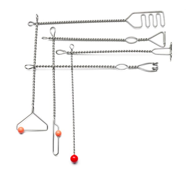 Set of instruments for speech therapist on white background