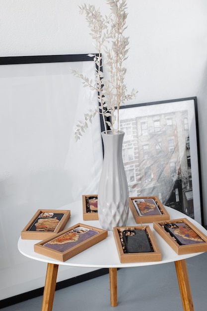 Set of iPhone cases on a white table in the interior of the store