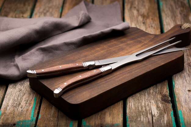 Set of kitchen knifes on a marble, top view. Table knives