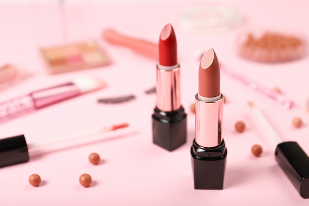 Set of lipsticks on the background of decorative cosmetics