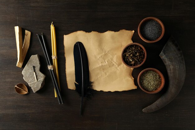 Photo a set of magical things on a dark table