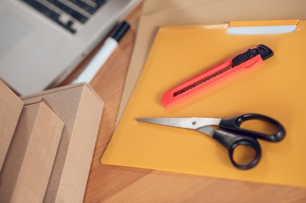 Set of materials on the desk prepared for packing goods