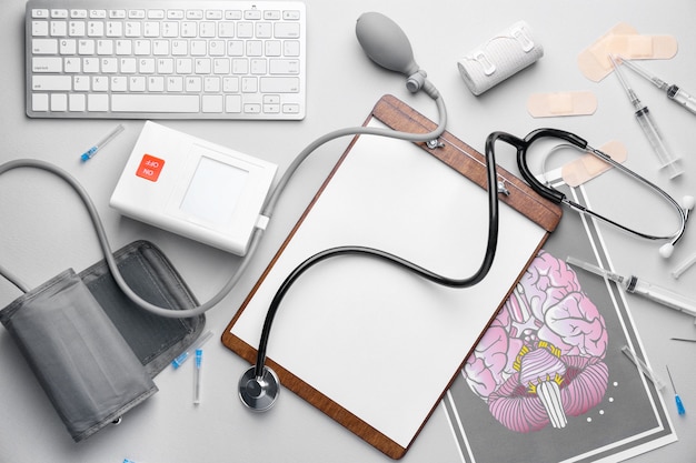 Photo set of medical supplies with computer keyboard on light background