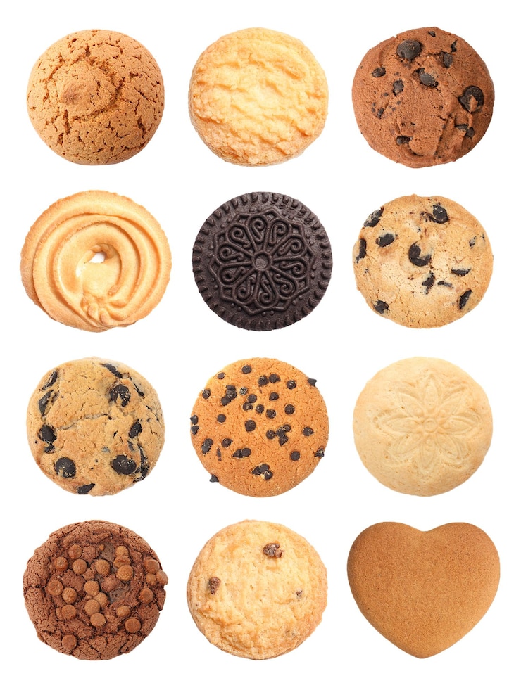 Foto set met heerlijke verschillende koekjes op witte achtergrond bovenkant