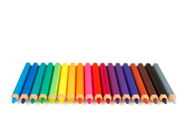 set of multicolored pencils on a white background closeup