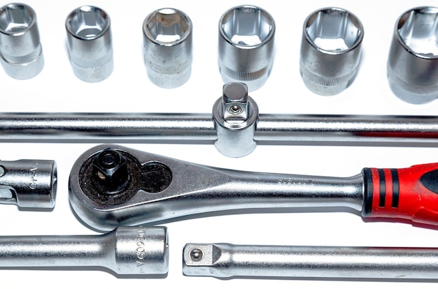 Set of new adjustable wrenches with handle holder adapters and extensions and detachable sockets