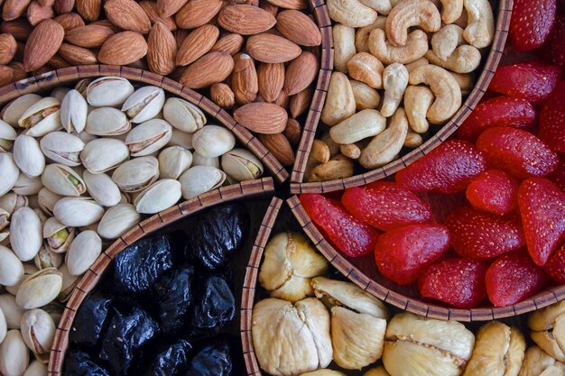 Set of nuts and dried fruits close up Food background