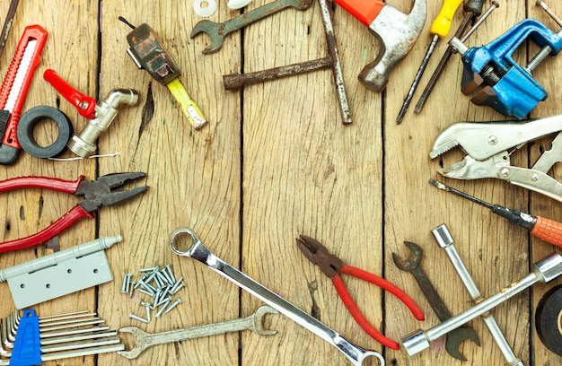 set of old tools on wooden background concept father day and labor day