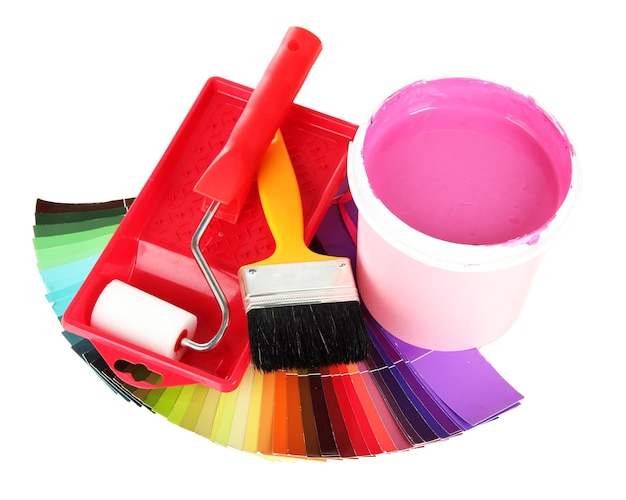 Set for painting paint pot brushes paintroller and palette of colors isolated on white