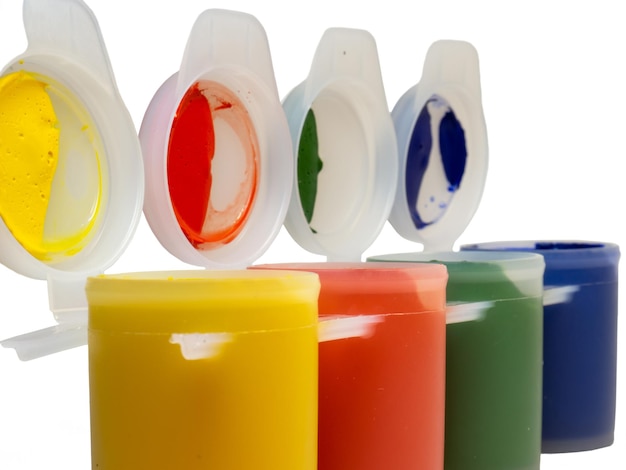 Set of paints on a white background Jars of gouache Preparing to paint