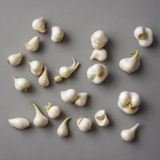 Photo a set of photos garlic cloves levitate on a white background