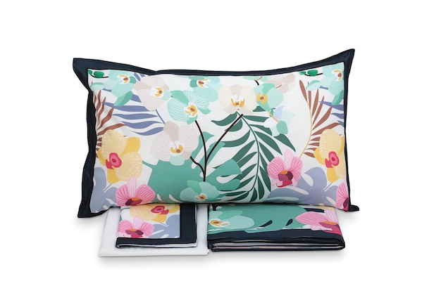 A set of pillows with tropical flowers on them.