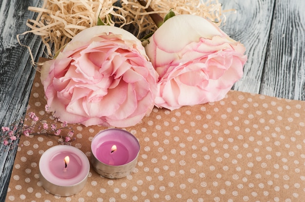 Set of pink roses with candles