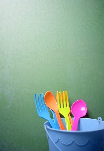 Set plastic fork and spoon for kid.