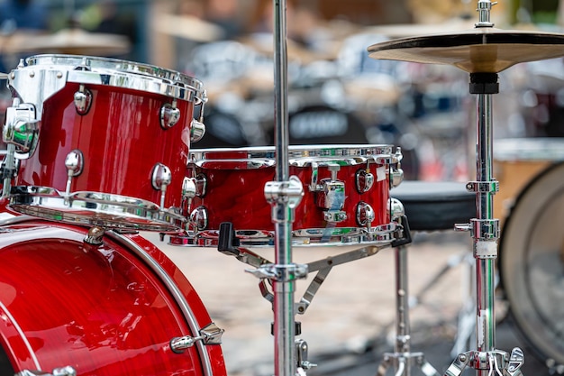 A set of plates in a drum set At a concert of percussion music selective focus closeup