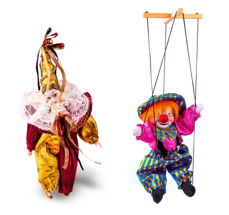Photo the set of porcelain sad clown dolls isolated on white background