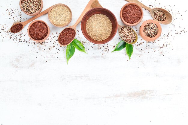 Photo set of quinoa on a white wooden background top view free copy space