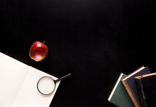 Set for reading on black desk