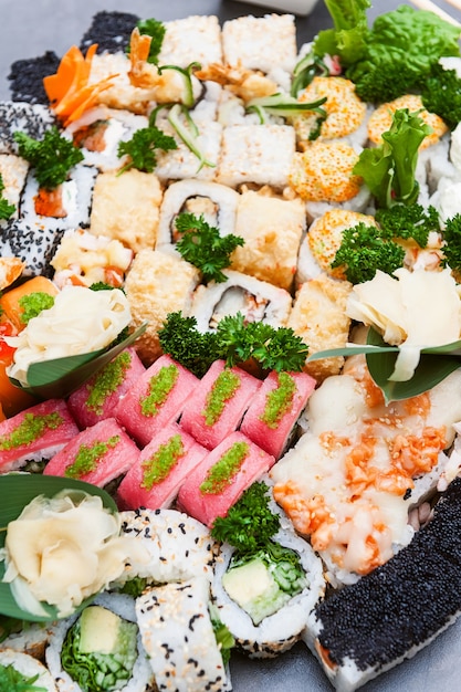 Set of real classic Japanese sushi. on a wooden surface