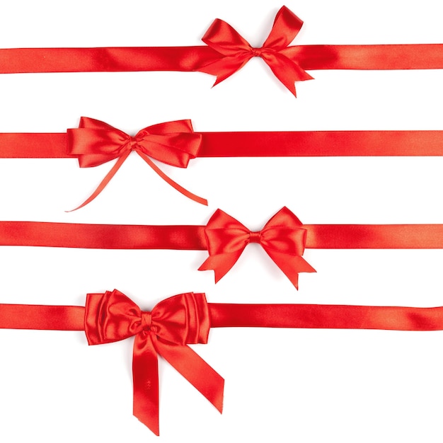 Set of red ribbon satin bows isolated on white background Christmas elements