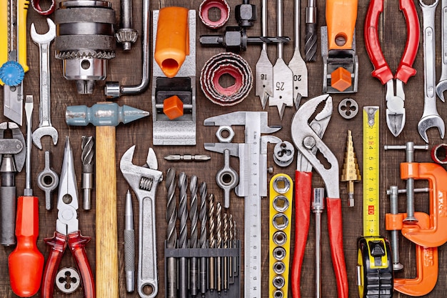 Set of repair tools DIY on  brown wooden surface