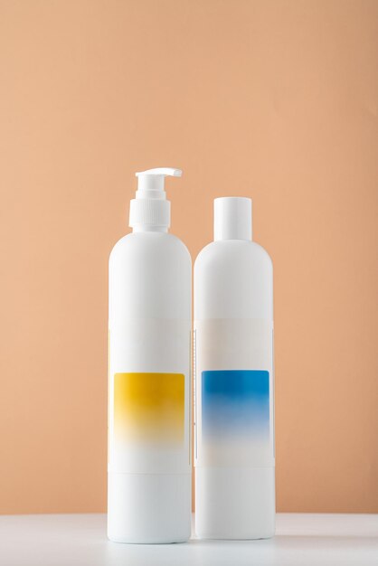 A set of shampoo bottles with empty labels Mocap of hygiene products