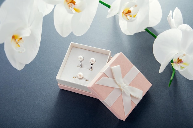 Set of silver ring and earrings with pearls in the gift box with white orchid Present for a Mother's Day